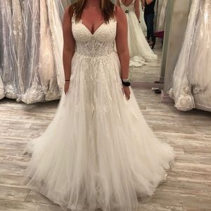Brand new wedding gown. Never worn. Unaltered